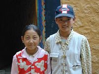Two young Tibetan girls visiting the nunnery.